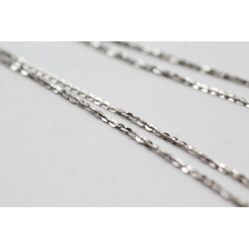 470 - 9ct white gold diamond twist pendant on chain (3.3g)