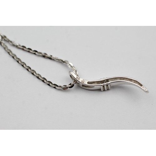 470 - 9ct white gold diamond twist pendant on chain (3.3g)