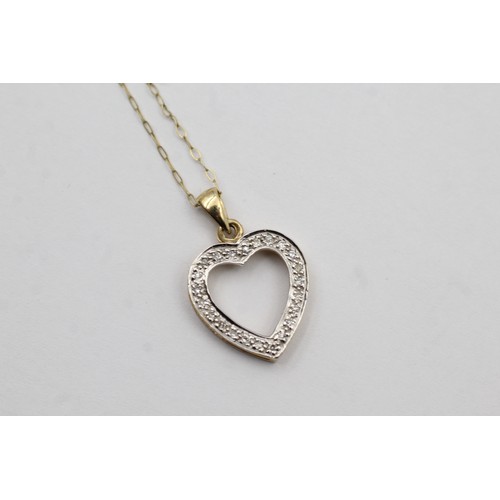 478 - 9ct gold diamond open heart pendant necklace (1.9g)