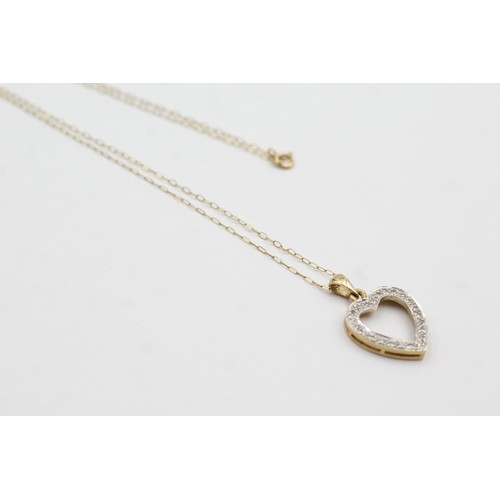 478 - 9ct gold diamond open heart pendant necklace (1.9g)