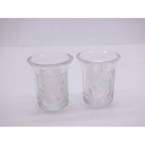 91 - PAIR OF LALIQUE SIGNED CRYSTAL L'ENFANTS SHOT GLASSES