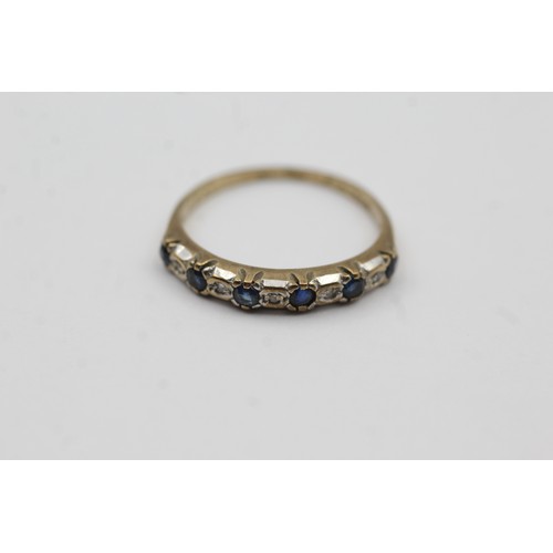 498 - 9ct gold sapphire & diamond single row dress ring (1.4g)- SIZE N