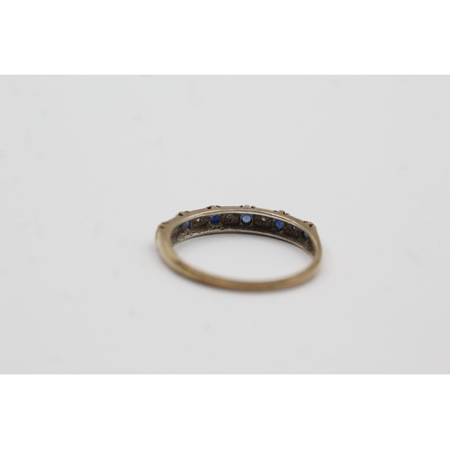 498 - 9ct gold sapphire & diamond single row dress ring (1.4g)- SIZE N