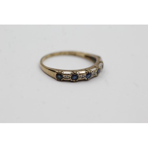 498 - 9ct gold sapphire & diamond single row dress ring (1.4g)- SIZE N