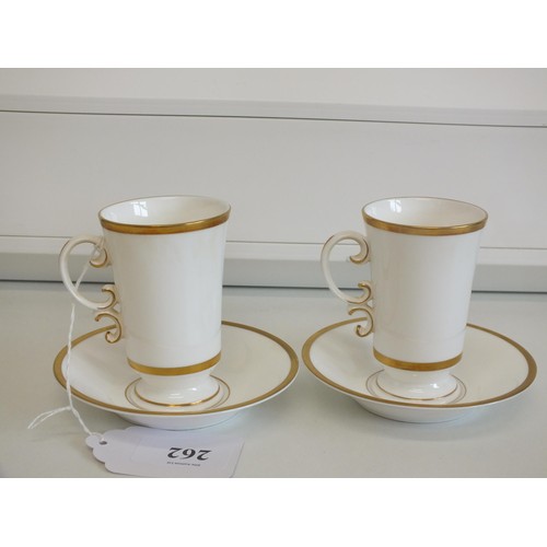 262 - PAIR OF ROYAL WORCESTER COFFEE CUPS WITH GOLD TRIM AND HARP MOTIFS AND SAUCERS