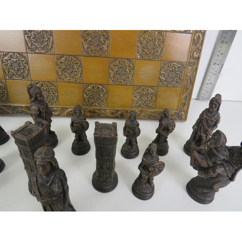 198 - CARVED WOODEN WAR OF THE ROSES CHESS BOARD AND PIECES