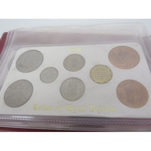 242 - ALBUM OF COINS OF GREAT BRITAIN SETS AND FOUR BRITAINS FIRST DECIMAL COIN SETS