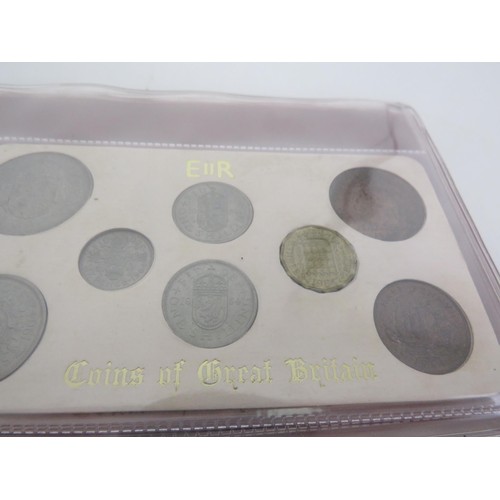 242 - ALBUM OF COINS OF GREAT BRITAIN SETS AND FOUR BRITAINS FIRST DECIMAL COIN SETS