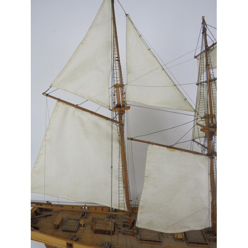 99 - LARGE SCALE MODEL WOODEN SAILING BOAT ON A WOODEN DISPLAY STAND LENGTH 38