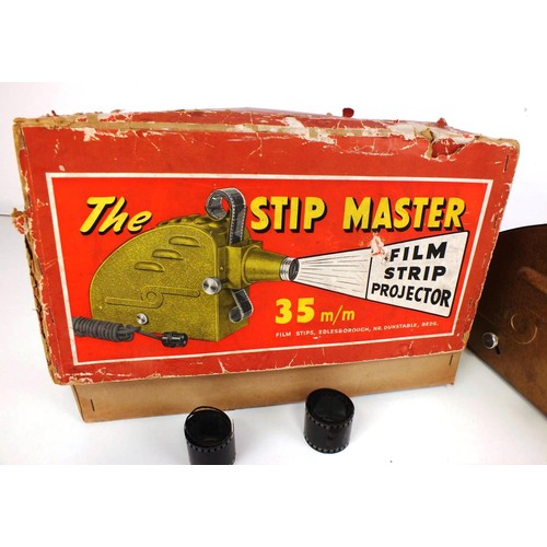 101 - A Stip Master 35mm film strip projector, and a collection of film strips including Disney