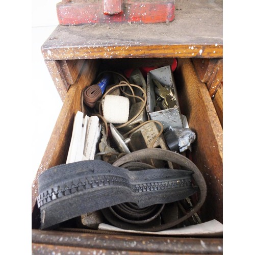 81 - Mid 20th Century cobbler's equipment - two shoe stretchers/vices and a two drawer cabinet containing... 