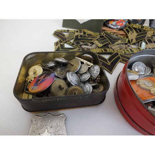 74 - TUB OF BADGES, PATCHES AND BUTTONS ETC