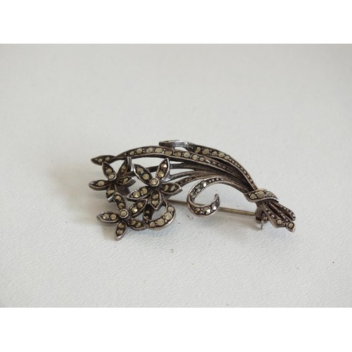 212 - SILVER AND MARCASITE FLORAL SPRAY BROOCH