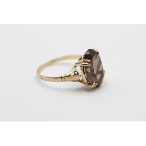 498 - 9ct Gold Oval Cut Smoky Quartz Solitaire Statement Ring (2.3g) - Size N