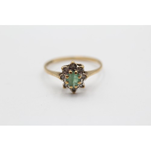 502 - 9ct Yellow And White Gold Diamond And Emerald Oval Halo Cluster Dress Ring (1.4g) - Size O