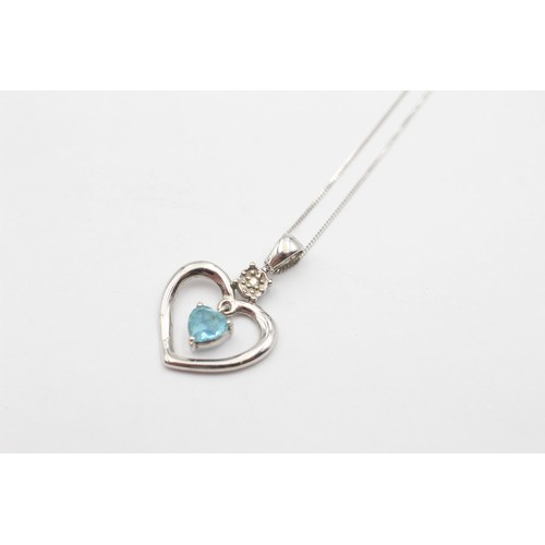 518 - 9ct White Gold Diamond And Topaz Heart Frame Pendant Necklace (1.7g)