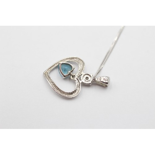 518 - 9ct White Gold Diamond And Topaz Heart Frame Pendant Necklace (1.7g)