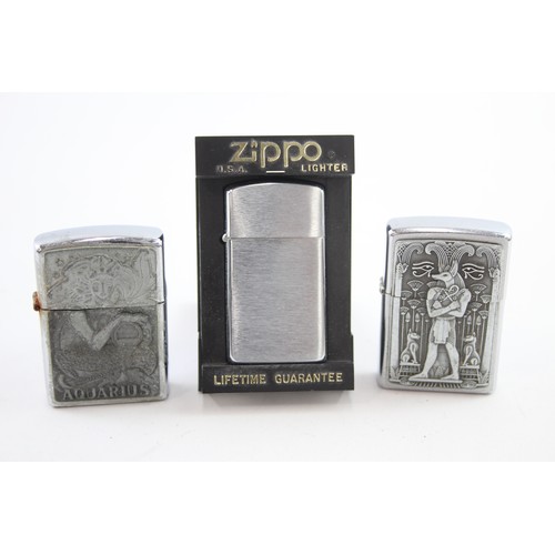 521 - 3 x Assorted ZIPPO Cigarette Lighters Inc Aquarius, Egyptian, Boxed etc