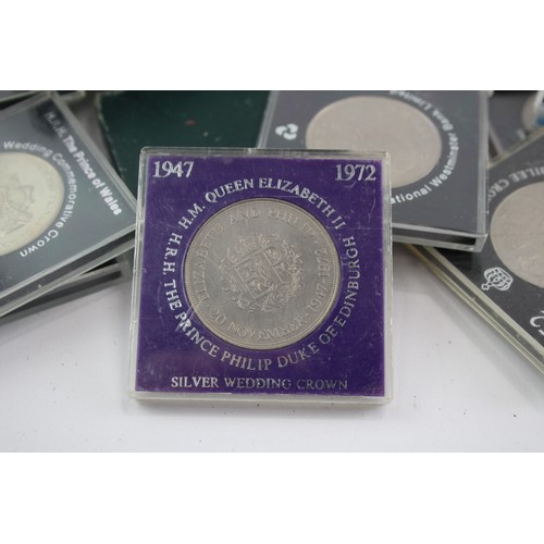 522 - 50 x Cased COMMEMORATIVE CROWN COINS inc. 25p, 1951 Festival, 1953 Coronation