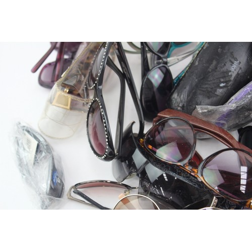 567 - 50 x Assorted SUNGLASSES Inc DKNY, Emporio Armani, Paul Smith etc