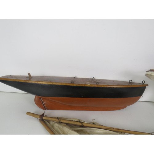 296 - TWO WOODEN MODEL SAILING YACHTS