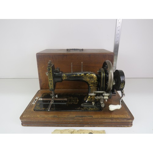 347 - FRISTER AND ROSSMAN ANTIQUE SEWING MACHINE WITH INSTRUCTIONS