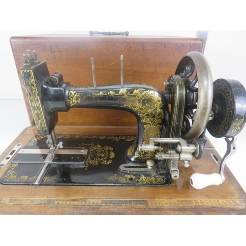 347 - FRISTER AND ROSSMAN ANTIQUE SEWING MACHINE WITH INSTRUCTIONS