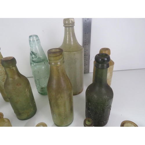 349 - COLLECTION OF OLD BOTTLES INCLUDES WAKEFIELD STONEWARE BOTTLE,THOMAS BARKER PONTEFRACT MARBLE COD BO... 