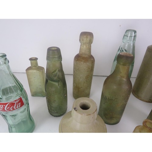 349 - COLLECTION OF OLD BOTTLES INCLUDES WAKEFIELD STONEWARE BOTTLE,THOMAS BARKER PONTEFRACT MARBLE COD BO... 