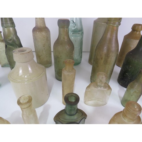 349 - COLLECTION OF OLD BOTTLES INCLUDES WAKEFIELD STONEWARE BOTTLE,THOMAS BARKER PONTEFRACT MARBLE COD BO... 