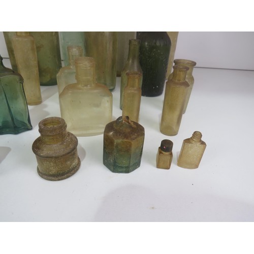 349 - COLLECTION OF OLD BOTTLES INCLUDES WAKEFIELD STONEWARE BOTTLE,THOMAS BARKER PONTEFRACT MARBLE COD BO... 