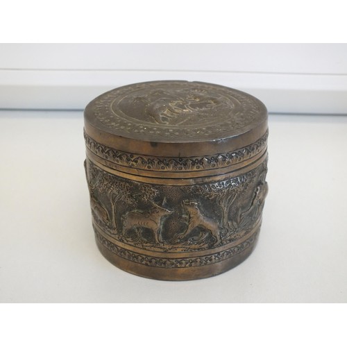 269 - ROUND COLONIAL INDIAN SILVER BOX WITH FIGURAL WORK DEPICTING DIFFERENT ANIMALS INCLUDING ELEPHANTS, ... 