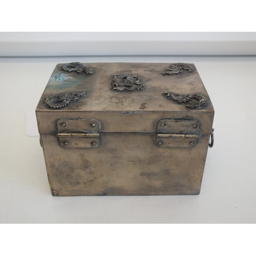 268 - CHINESE SILVER TRINKET BOX WITH DRAGON & BIRD MOTIFS AND TWO RING HANDLES, IMPRESSED MARK TO THE BAS... 