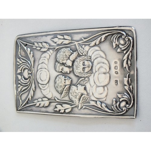 233 - ORNATE 1916 STERLING SILVER PHOTOGRAPH FRAME 12cms x 9cms and STERLING SILVER CHERUB BOOK COVER