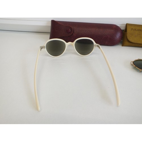 246 - POLAROID CLIP-ON SUNGLASSES AND RETRO LONG ARM CREAM SUNGLASSES BOTH WITH CASES