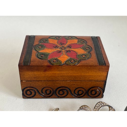 397 - SMALL WOODEN TRINKET BOX FULL OF SILVER ITEMS OF JEWELLERY INCLUDING SILVER CHARMS