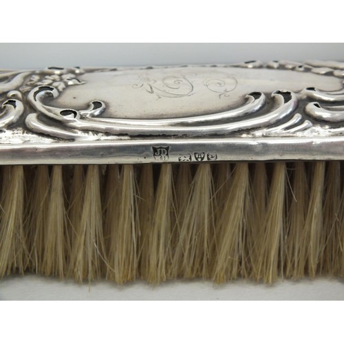 286 - 3 x SILVER BACKED HAIR BRUSHES AND A SILVER SHOE HORN