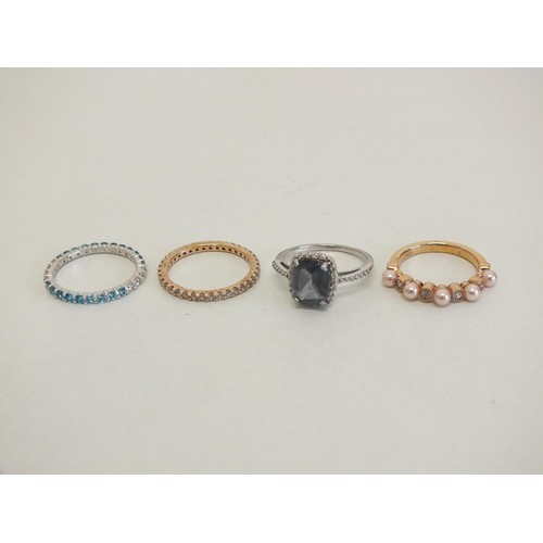 171 - 4 x STERLING SILVER RINGS- WORN