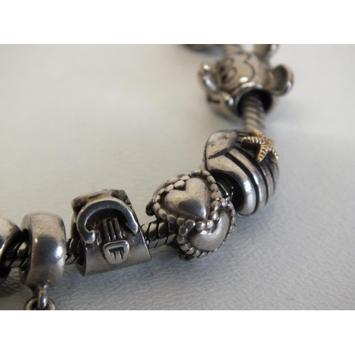 231 - GENUINE PANDORA BRACELET WITH 12 PANDORA CHARMS INCLUDES DISNEY MINNIE & MICKEY MOUSE & SILVER SHELL... 