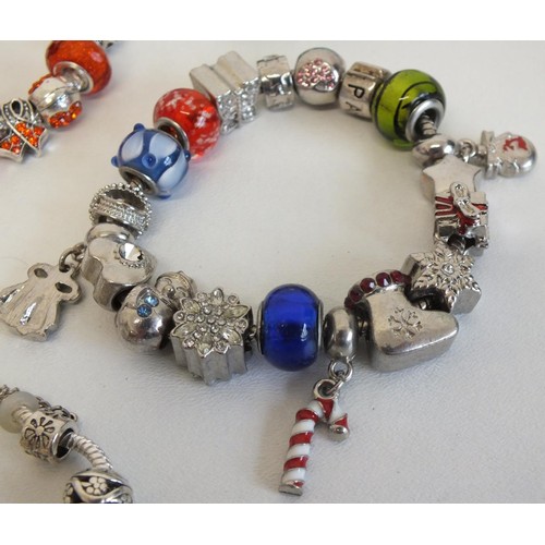 240 - 7 ASSORTED FASHION CHARM BRACELETS