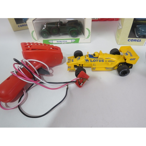 329 - FIVE MODEL CARS AND A SCALEXTRIC F1 RACING CAR WITH 2 HAND CONTROLLERS - AS FOUND