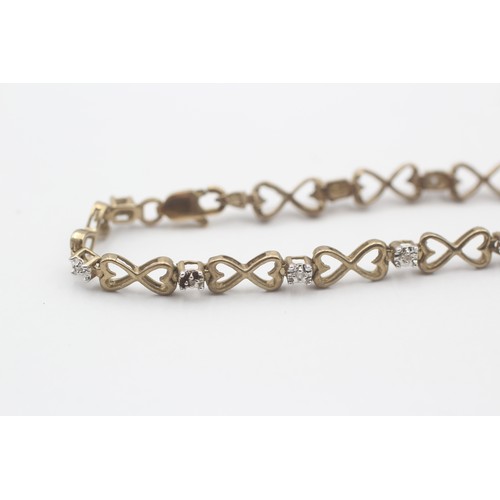 406 - 9ct White And Yellow Gold Diamond And Openwork Heart Links Fancy Chain Bracelet (4.3g)