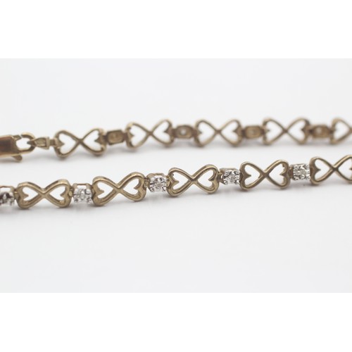 406 - 9ct White And Yellow Gold Diamond And Openwork Heart Links Fancy Chain Bracelet (4.3g)