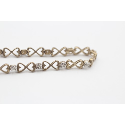 406 - 9ct White And Yellow Gold Diamond And Openwork Heart Links Fancy Chain Bracelet (4.3g)