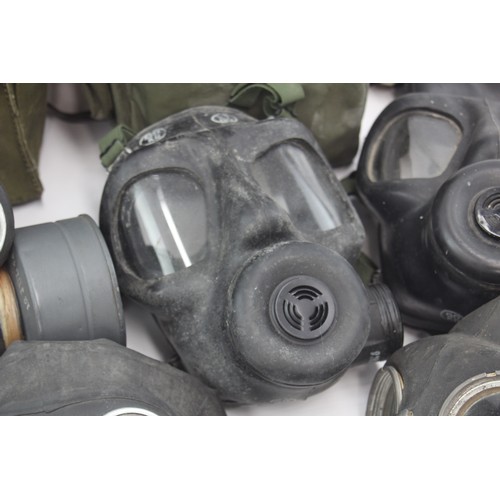 426 - 7 x Vintage Gas Masks