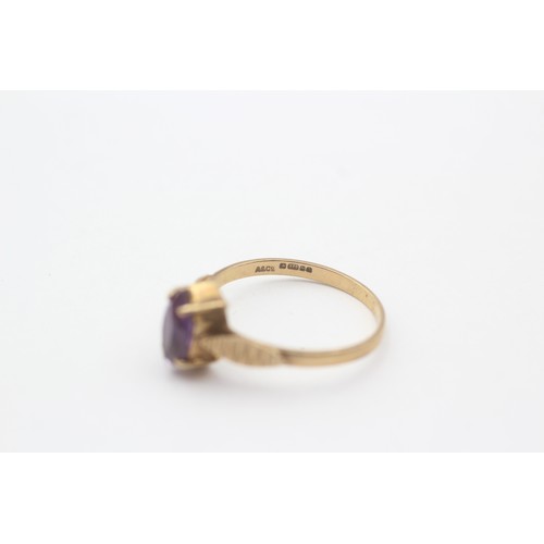 430 - 9ct Gold Amethyst Marquise Cut Textured Leaf Shoulder Detail Solitaire Ring (1.9g) - Size P