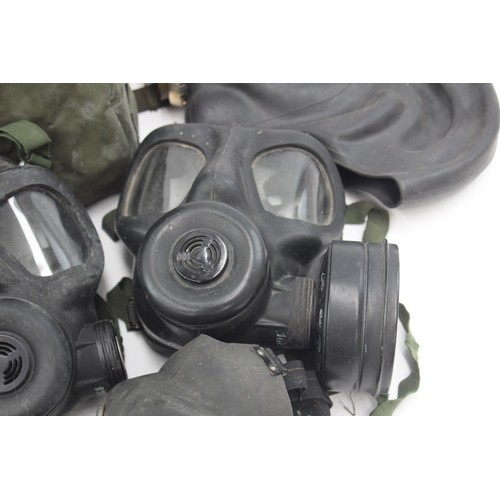 426 - 7 x Vintage Gas Masks