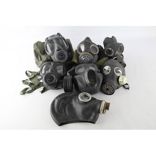 426 - 7 x Vintage Gas Masks