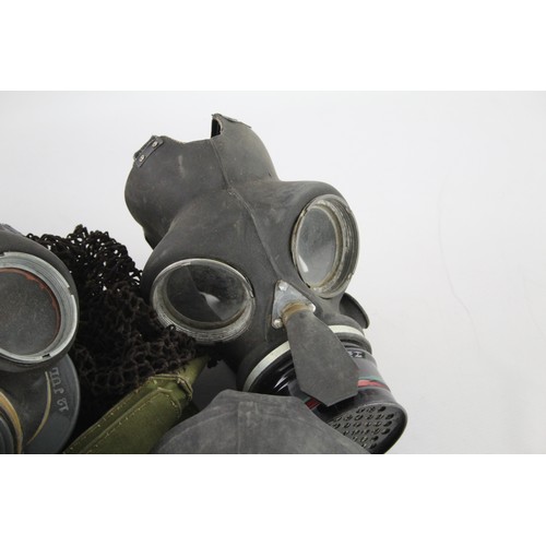 426 - 7 x Vintage Gas Masks