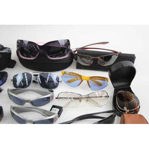 441 - 25 x Assorted SPORTS STYLE Sunglasses Inc Bloc, Bolle, Maui Jim etc